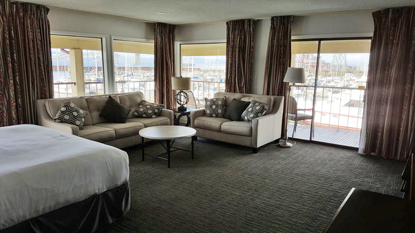 Premium King with Marina View and Wrap-around Balcony (Non-Pet Friendly) Photo 1
